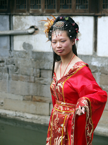 women in red dress