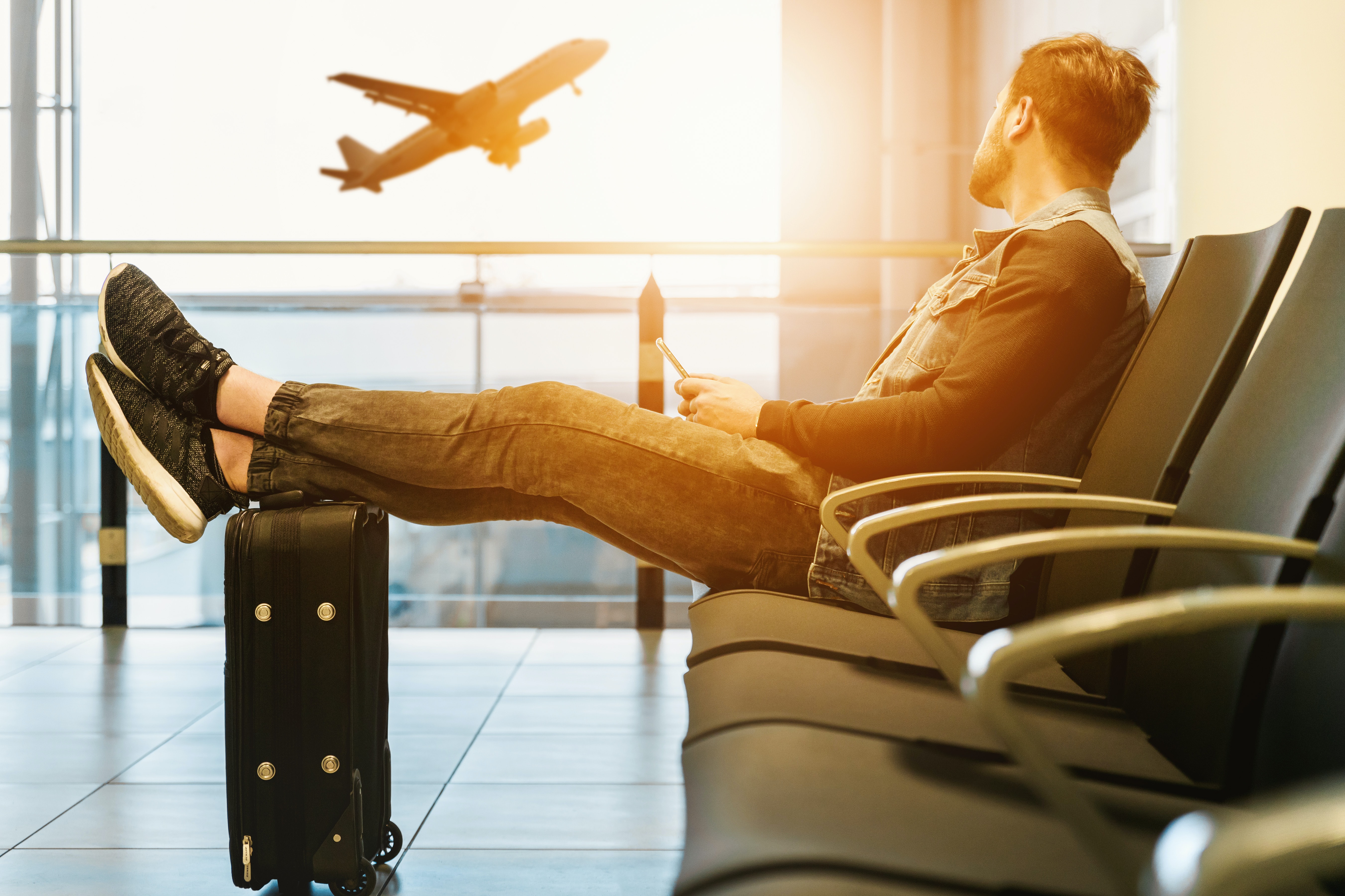 Man sitting in airport waiting