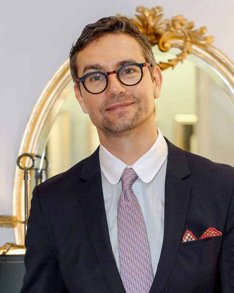 Dr. Konstantin in a suit