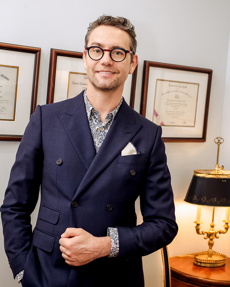 Dr. K in a blue suit