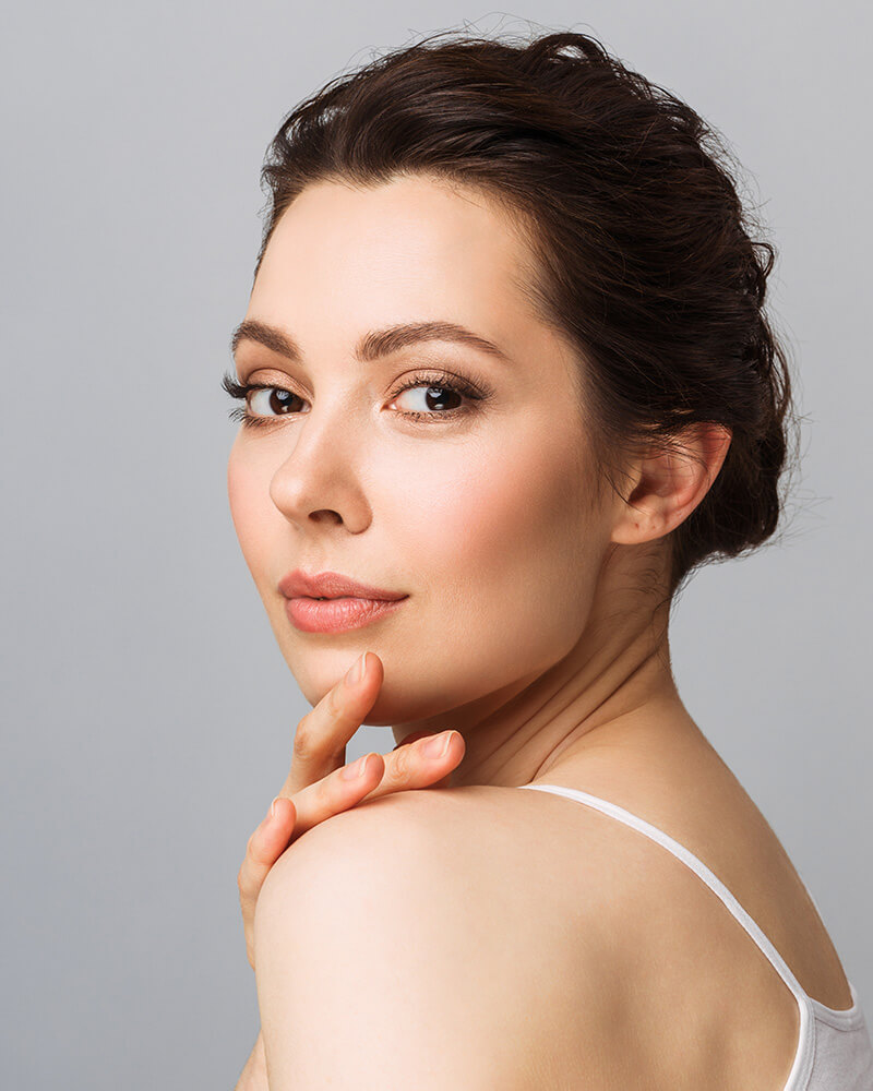 Woman looking over her shoulder