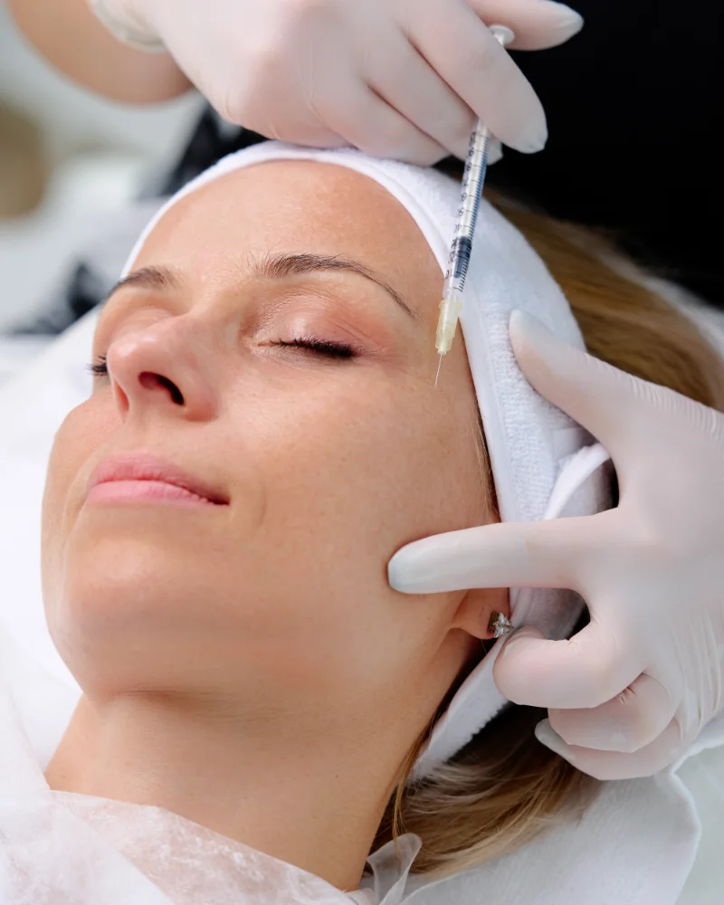 woman getting injectable treatment
